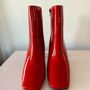 Jeffrey Campbell Red Patent Boot -Never worn. Imperfection/left side boot